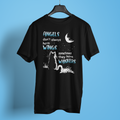 Black t-shirt with a graphic and text on a hanger against a blue background